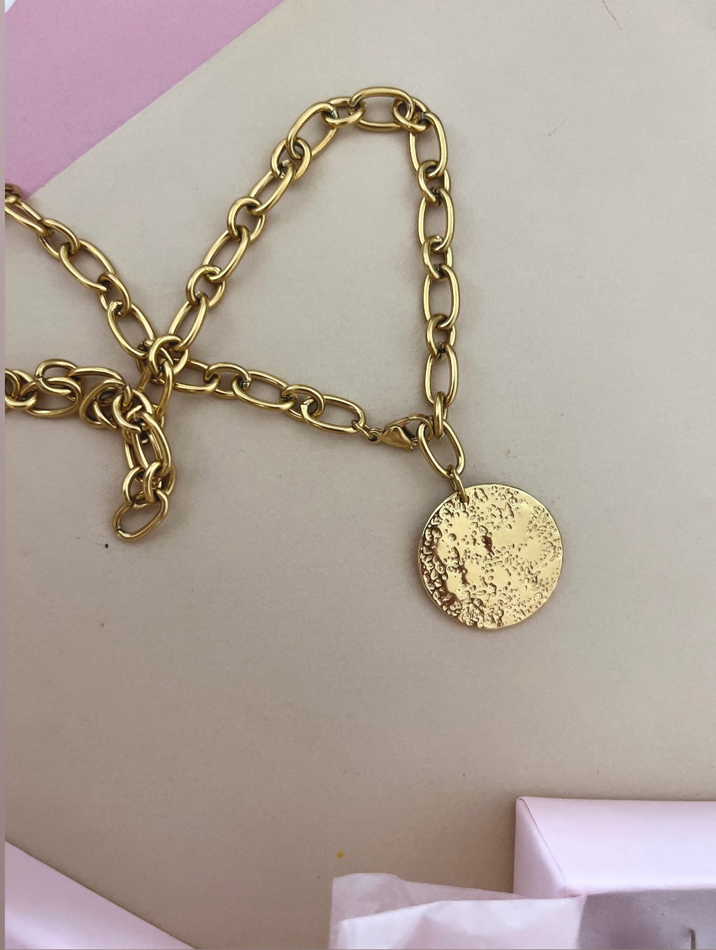 Collier COME
